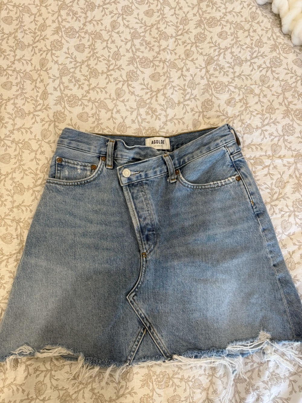 Agolde Light Wash Denim Mini Skirt with Frayed Hem